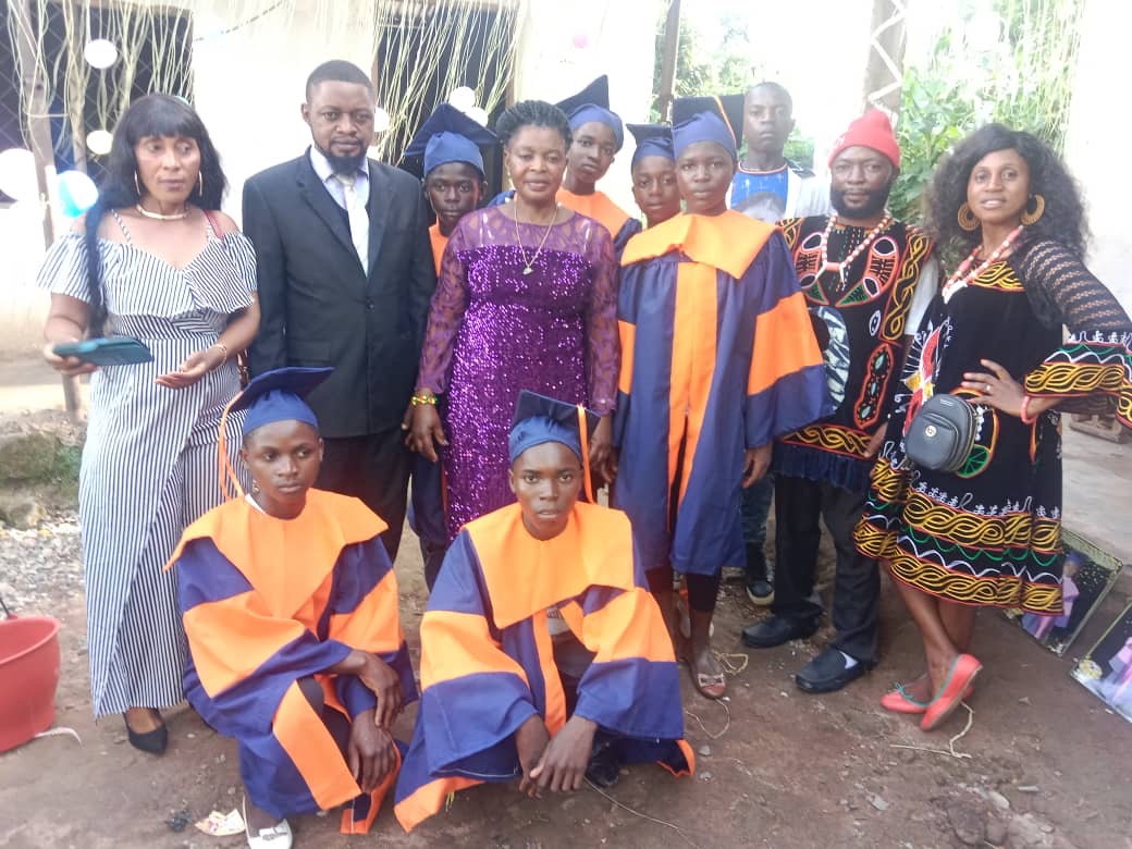 Balu students at their graduation ceremony with family and teachers
